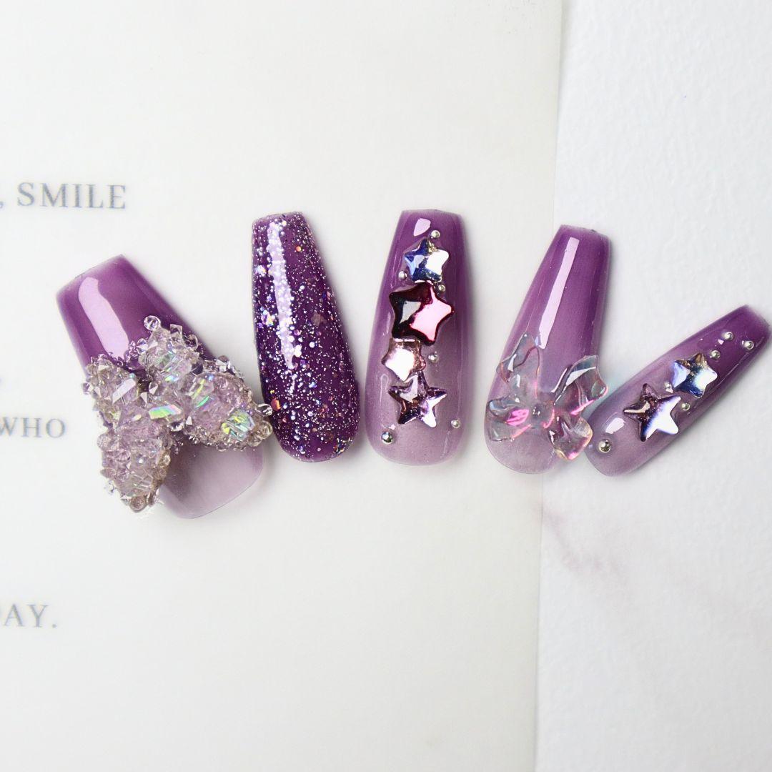 Purple gradient press-on nails with 3d butterfly and star decal